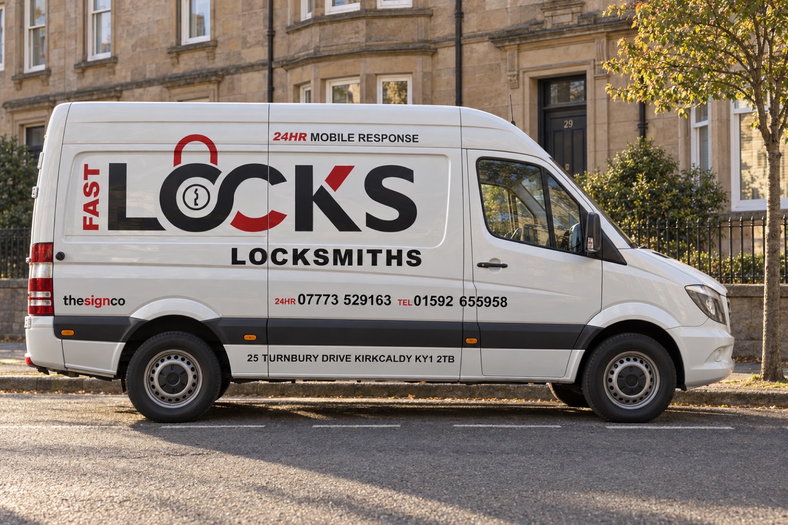 The Fast Locks Locksmiths van, a white Mercedes Sprinter, parked side-on outside sandstone tenements in Kirkcaldy